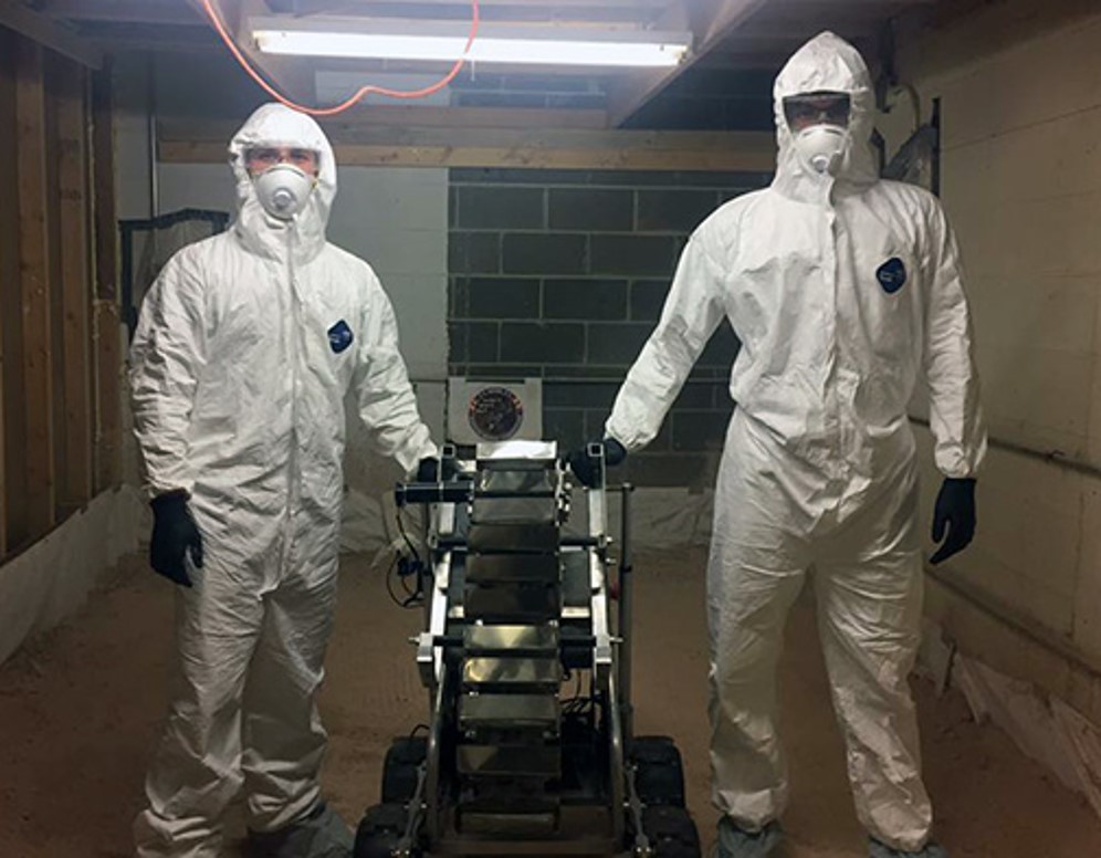 scientists wearing protective gear