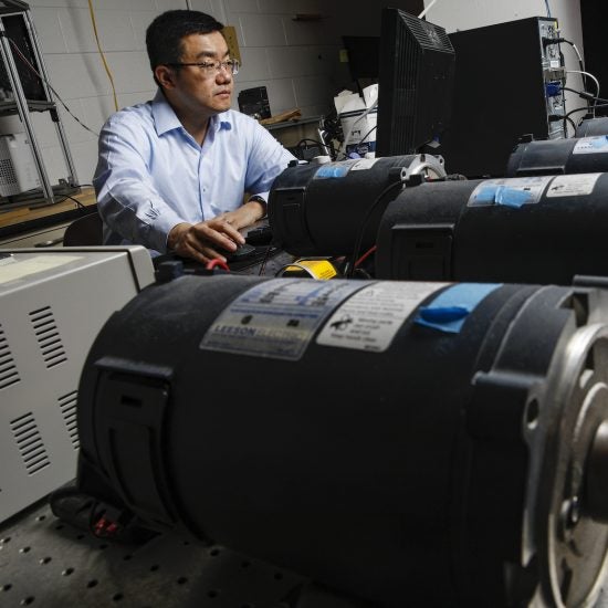 IE faculty member Lin Li in his lab