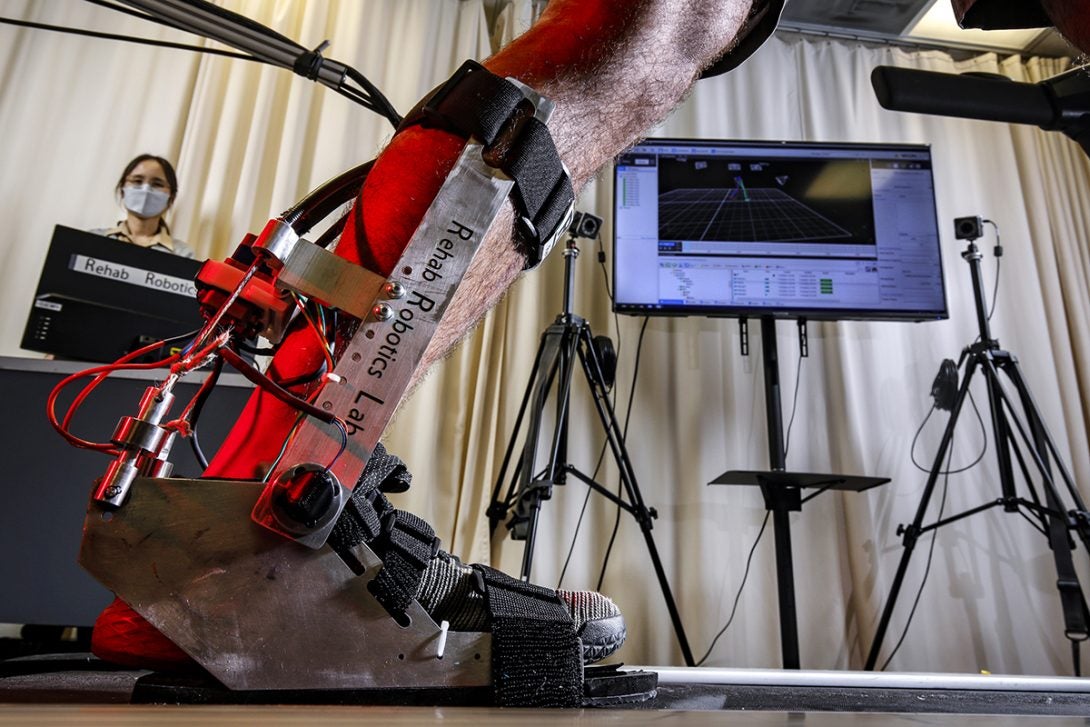 Myunghee Kim conducting research in her Rehab Robotics laboratory.