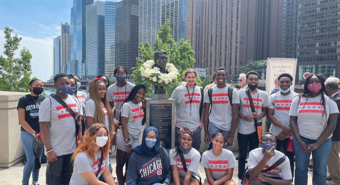 18 of 19 DuSable Scholars at the wreath laying ceremony to commemorate the 203rd anniversary of Jean-Baptiste Pointe DuSable hosted by DuSable Heritage Association.