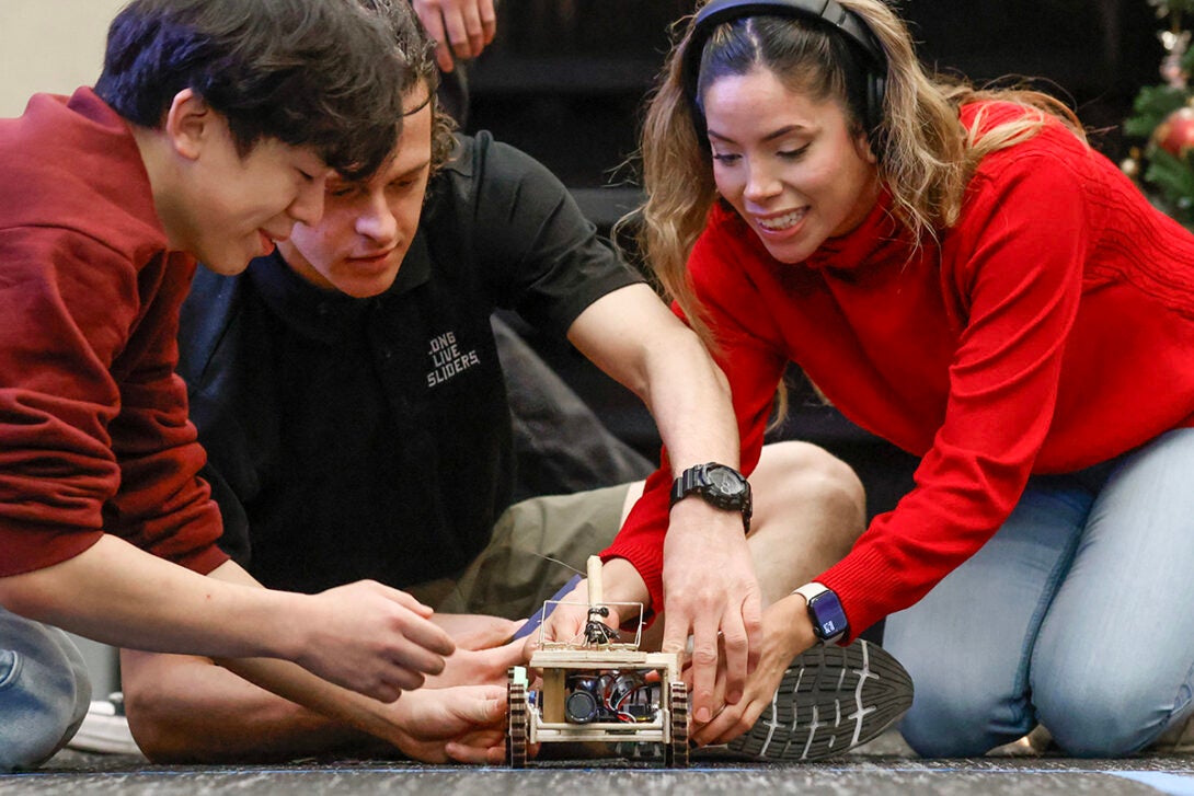 Mechanical and industrial engineering students raced their mouse trap vehicles with autonomous braking systems for their ME 250 final projects this semester.