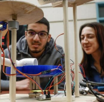 MIE engineering students working on a project 